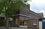 De achterzijde, waar vroeger de filmzaal was, zit nu een winkel
<br/>
Richard Keijzer, 2015-07-12